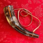 plain cow blowing horn